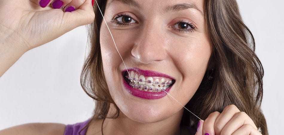 how_to_floss_with_braces